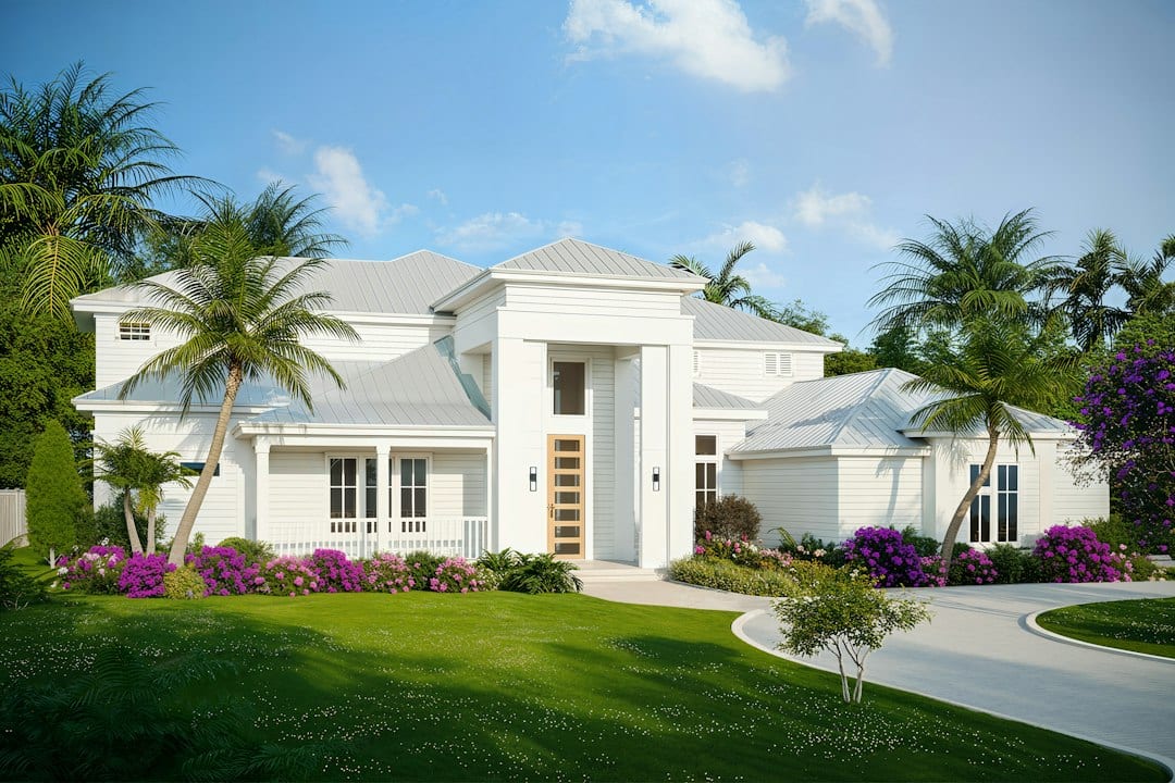 Modern white landed home with lush landscaping
