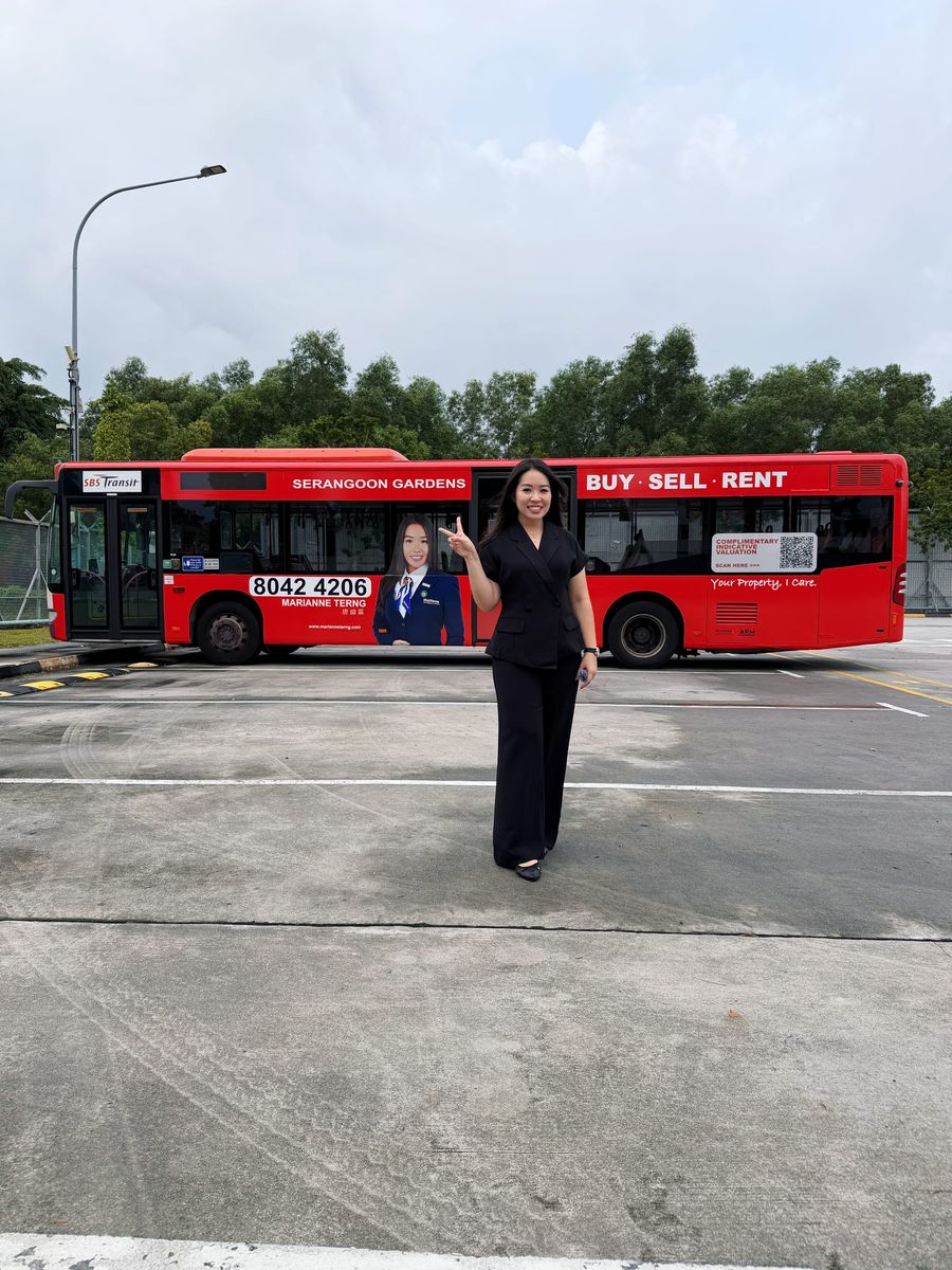 Marianne Terng with Serangoon Gardens bus advertisement showing local hyperlocal marketing presence